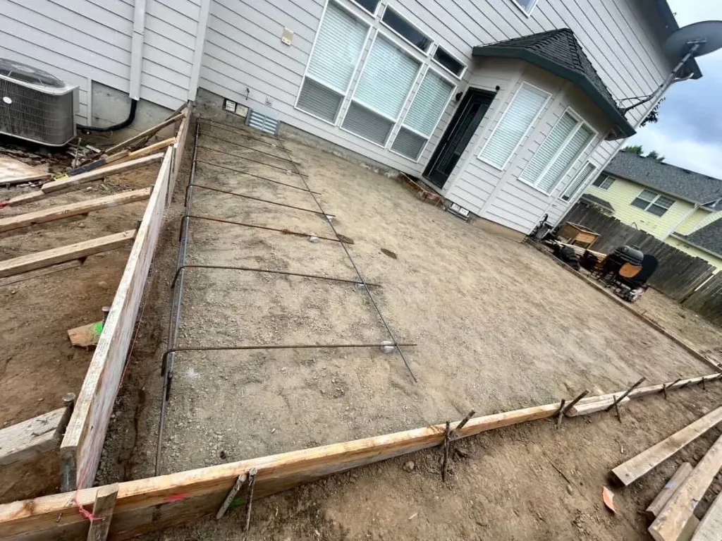Before: area prepared with form-work and rebar