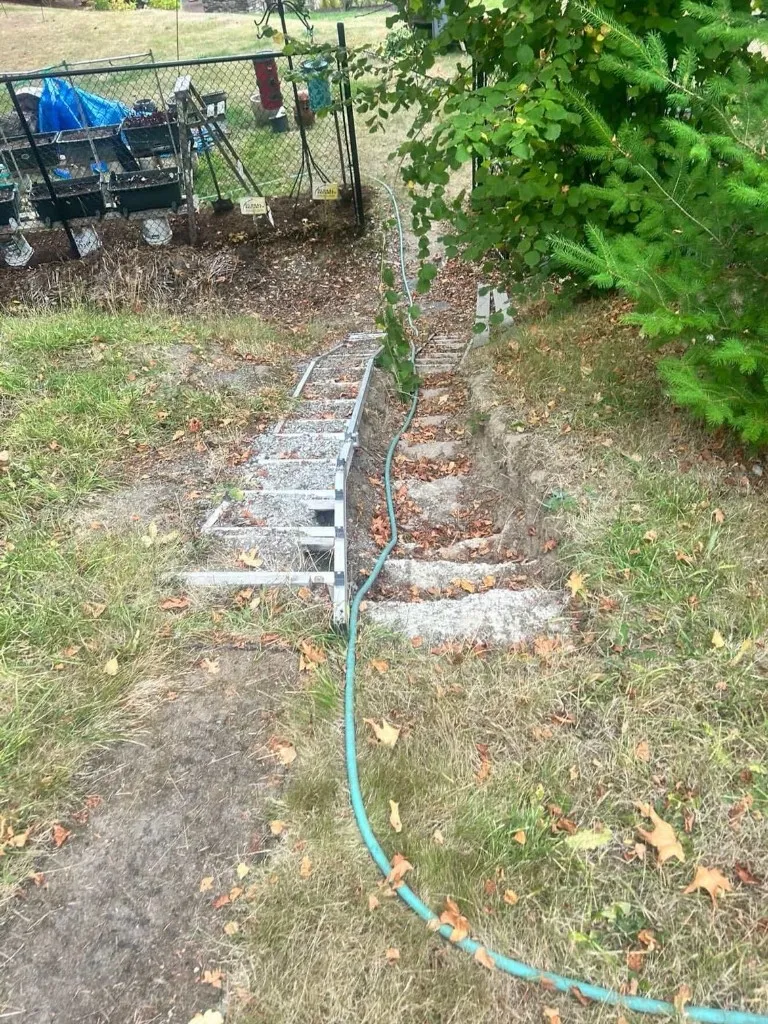 Before: worn outdoor steps in need of repair